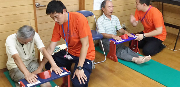 Elderly residents in the central-eastern city of Fujisawa, Japan, exercising as part of Keio University's '+10 project' to increase their daily activity by ten minutes.