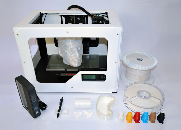 A 3D printer used by Keio researchers to digitally fabricate objects such as a pen holder and cranial model for nursing and healthcare.